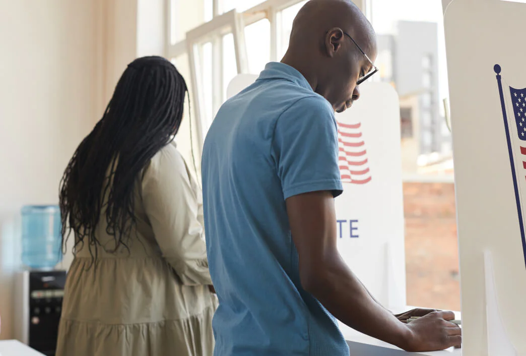 Voting Process at a Polling Place Voter casting a ballot at a polling station